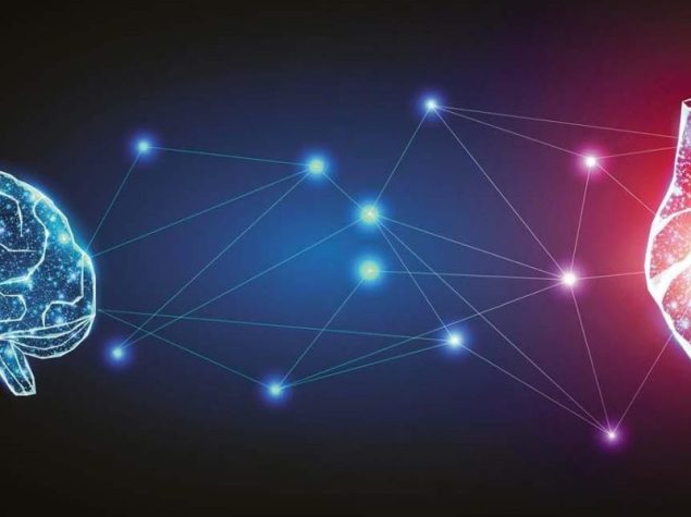 un cervello e un cuore, luminosi e illuminati, che fluttuano su uno sfondo blu scuro, con punti luce tra di loro